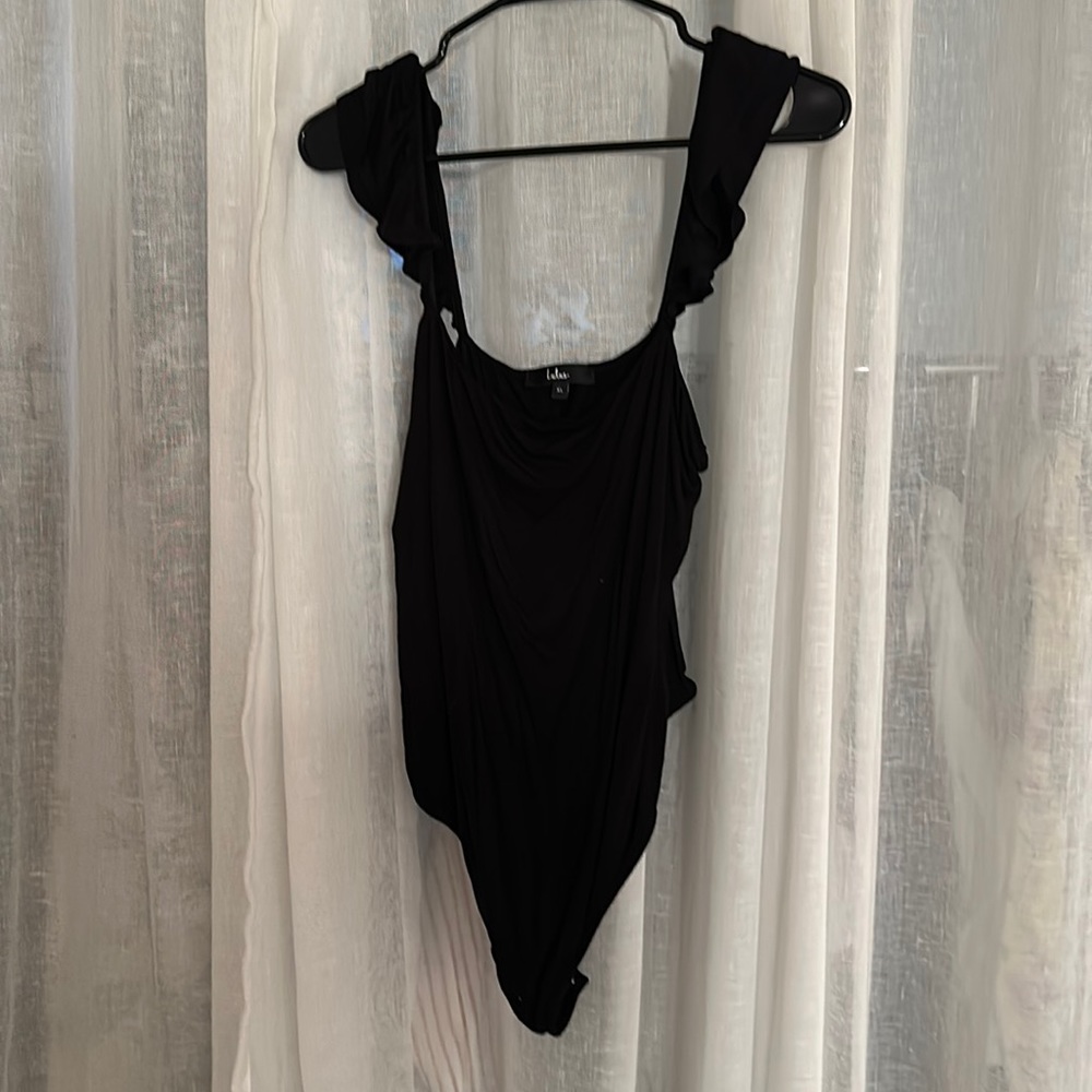 Lulu’s black bodysuit with ruffle cap sleeves